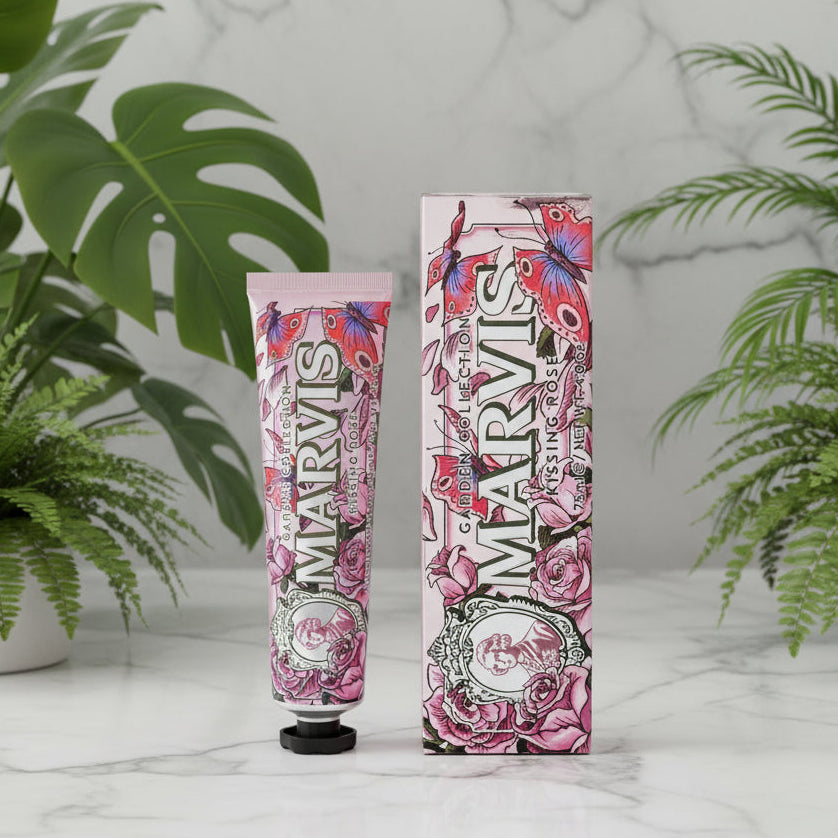 Marvis toothpaste tube and packaging with floral design on a white background