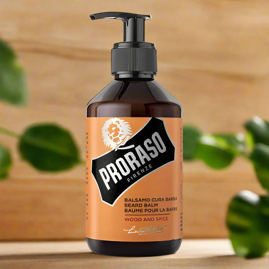 A 300ml jar of Proraso Beard Balm Wood and Spice. The packaging features a dark brown design with a large silver label, clearly displaying the wood and spice scent. The larger jar is designed for extensive use, making it ideal for maintaining a well-groomed beard.