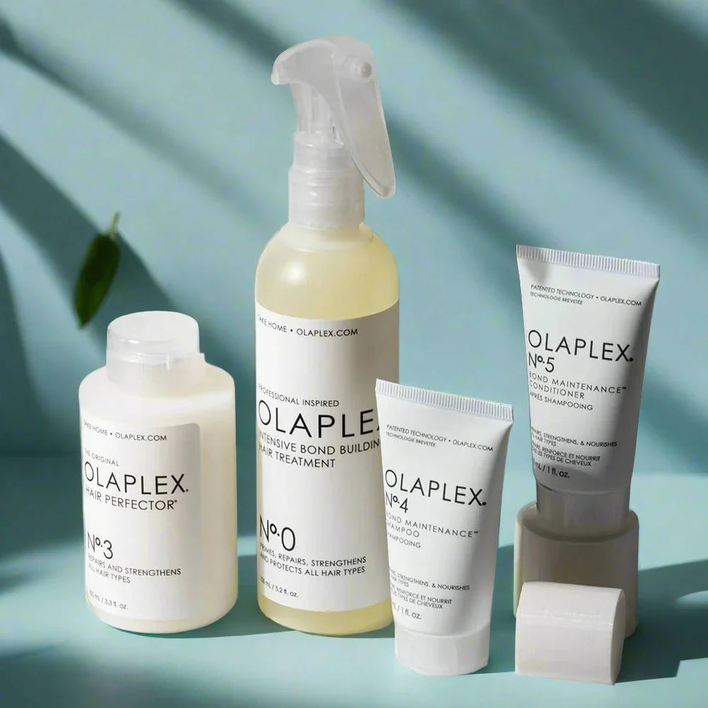 “Olaplex Trial Kit containing small-sized versions of Olaplex  No. 0, No. 3, No. 4, and No. 5 for hair repair and maintenance.