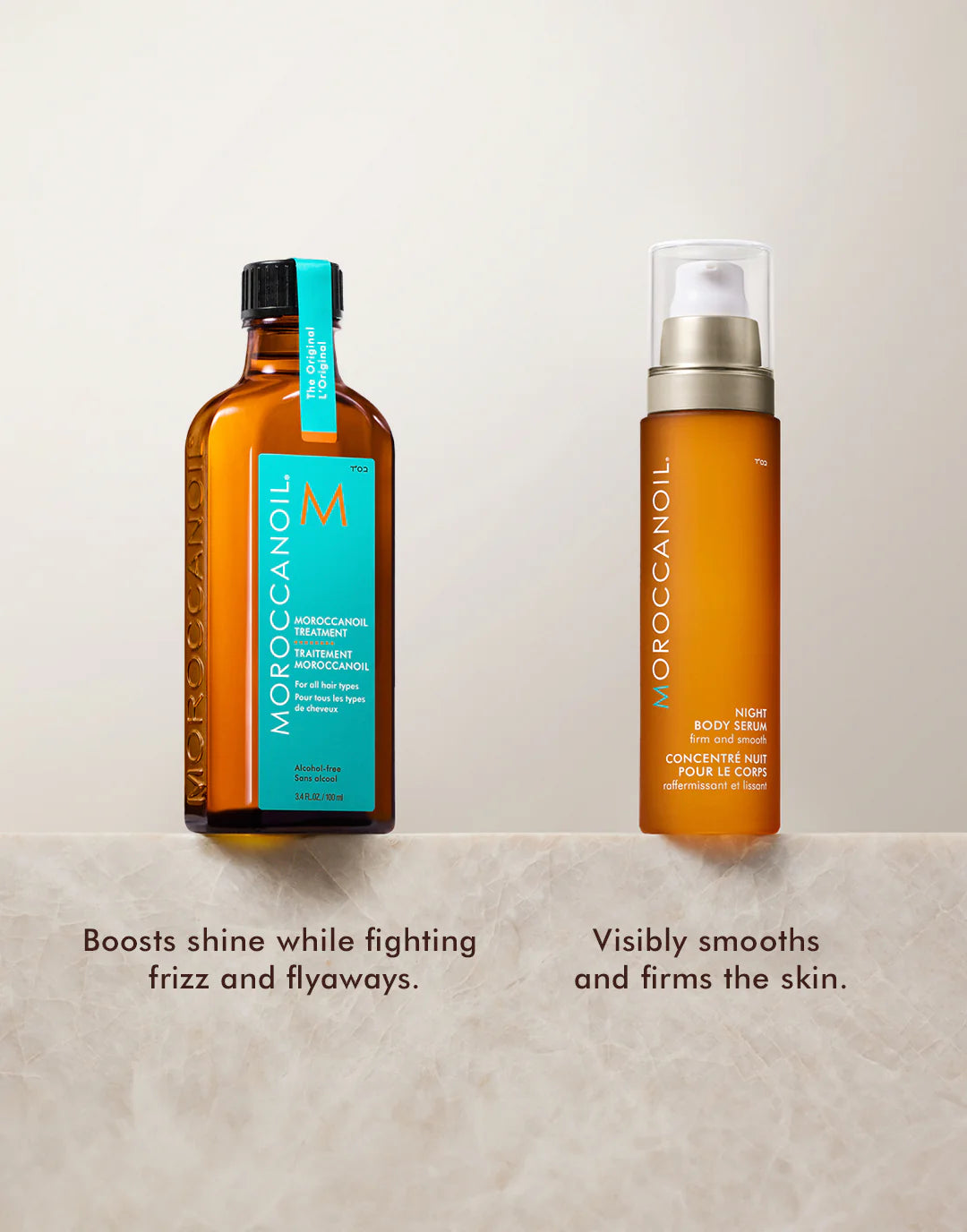 Two bottles of Moroccanoil hair care products on a light background