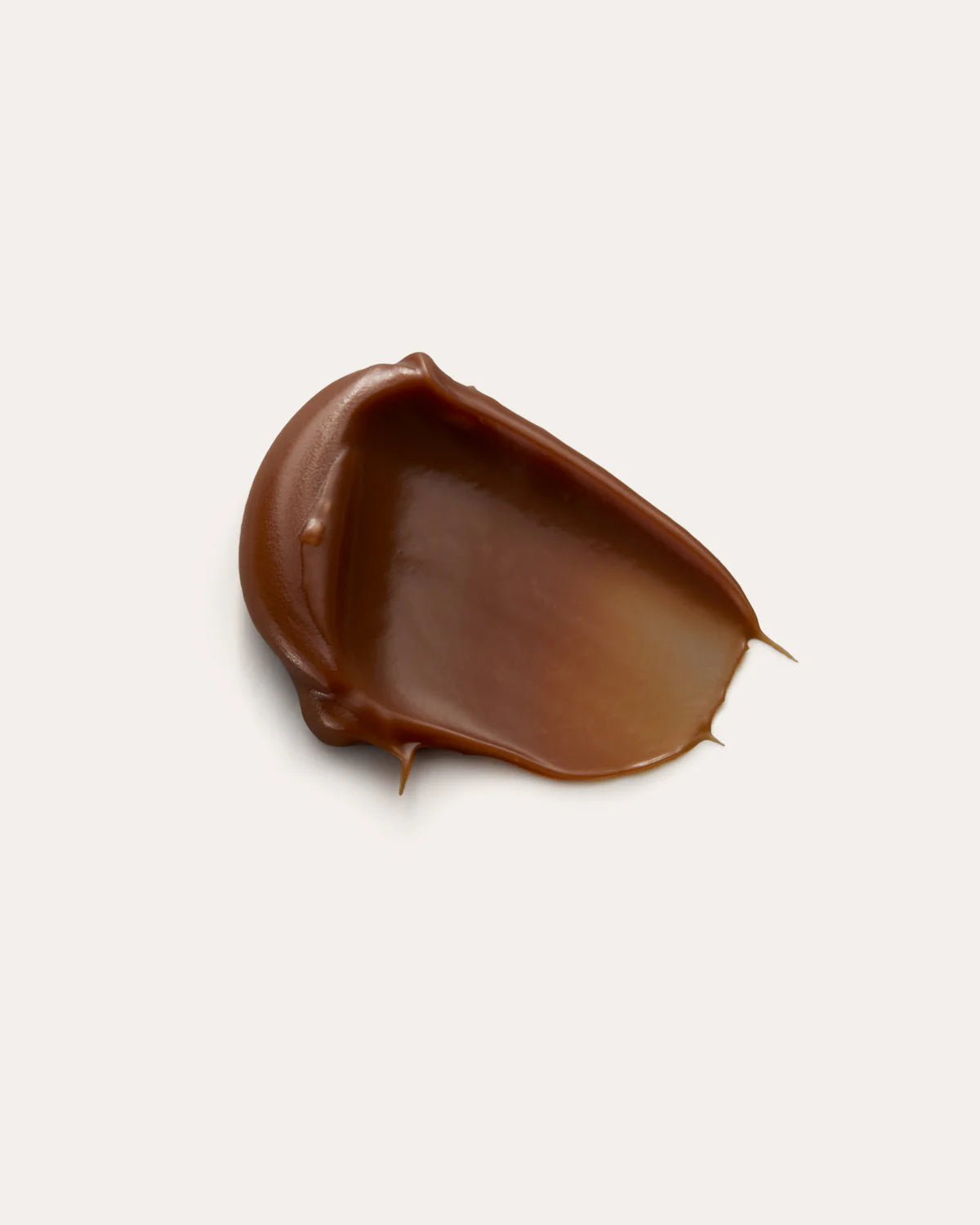 Close up of soft sand cream texture with a smooth, refined appearance.