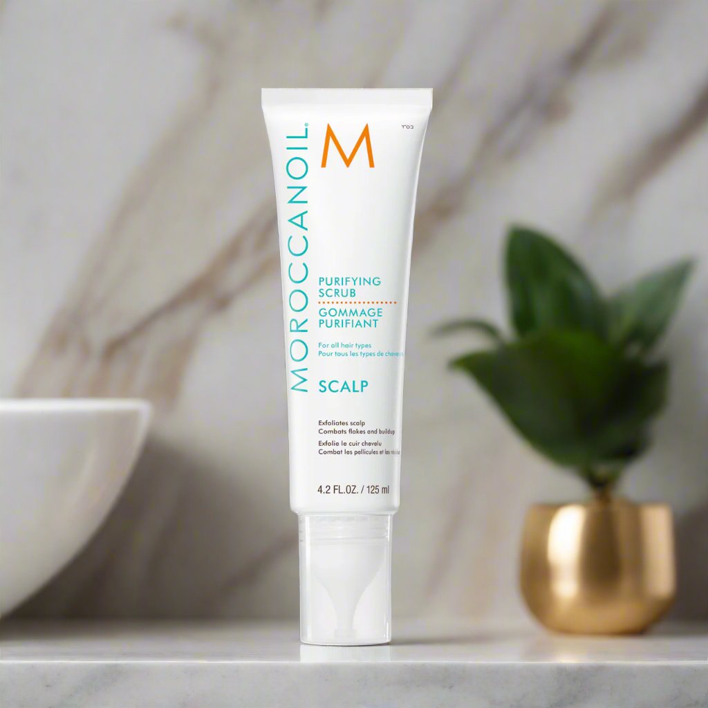 Moroccanoil Scalp Purifying Scrub 125ml bottle on a white background, featuring a clear lid and brand logo.