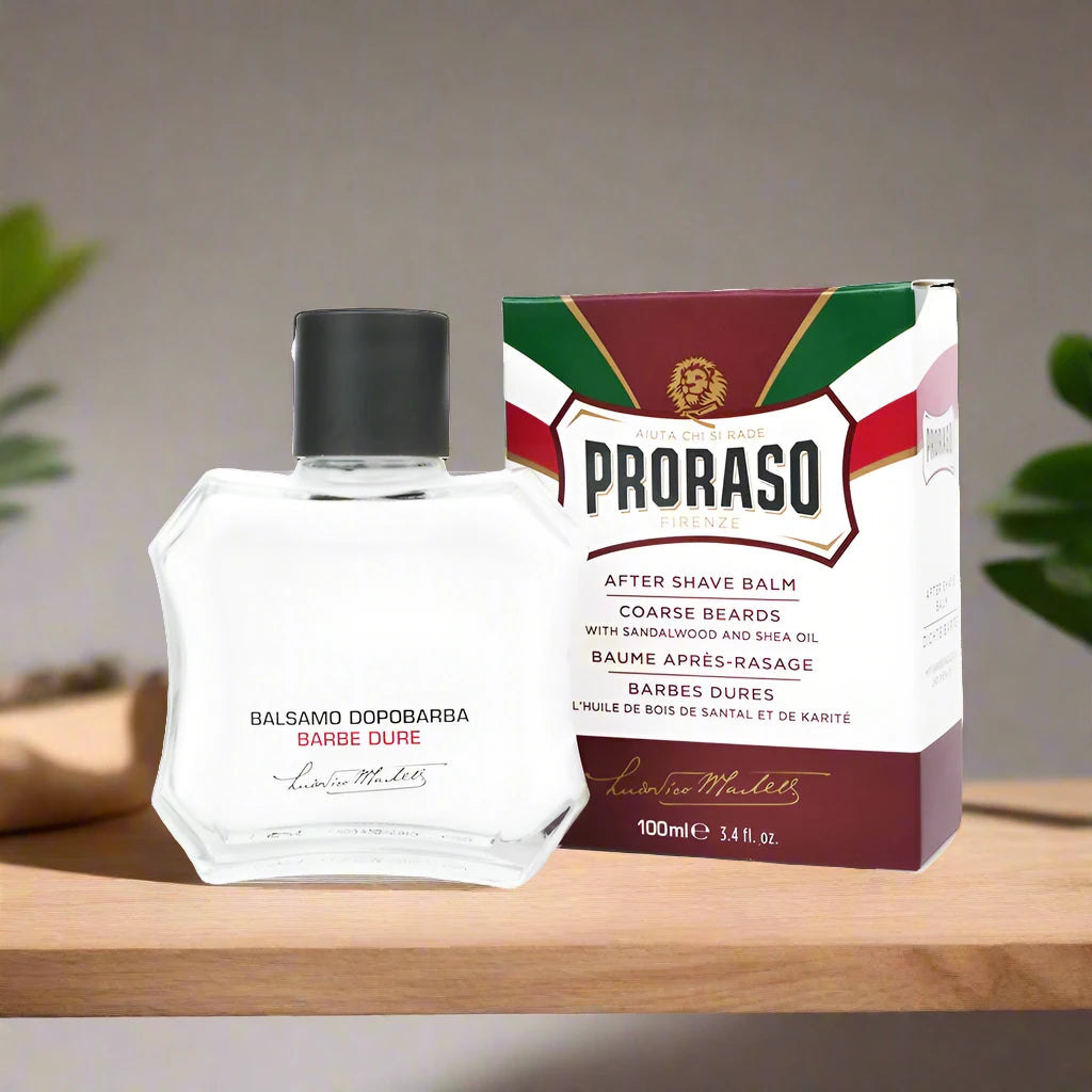 A 100ml bottle of Proraso After Shave Balm Coarse Beard. The packaging features a dark green and silver color scheme with a clear label displaying the product name and specific formulation for coarse beards.