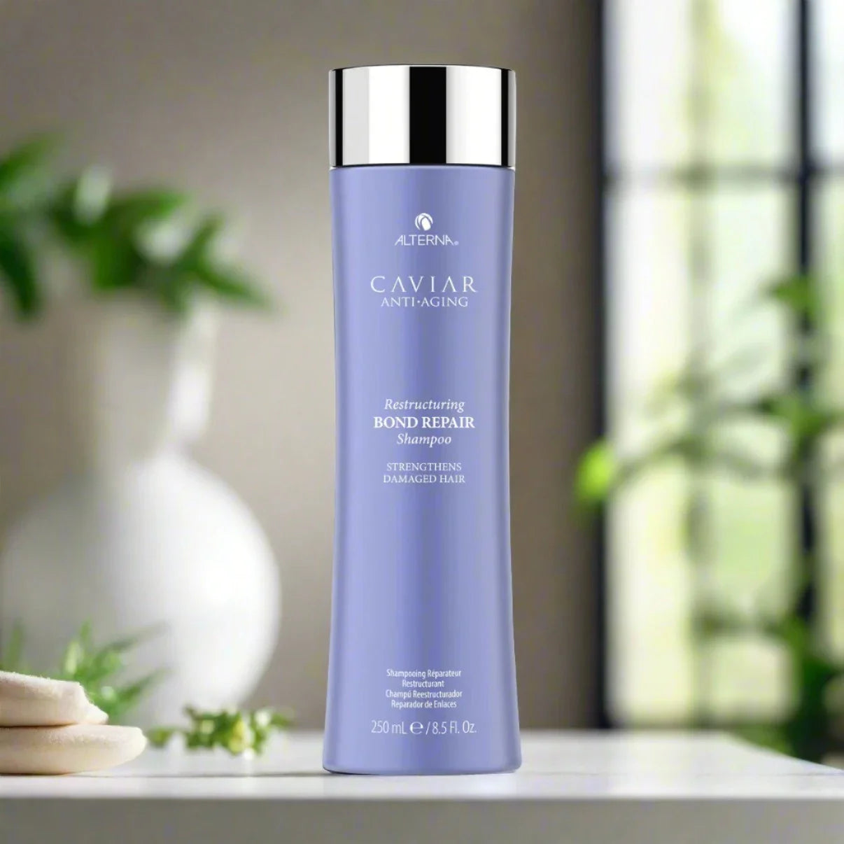 Alterna caviar Bond Repair Shampoo 8.5 oz bottle, designed to strengthen and repair damaged hair bonds while providing deep hydration.