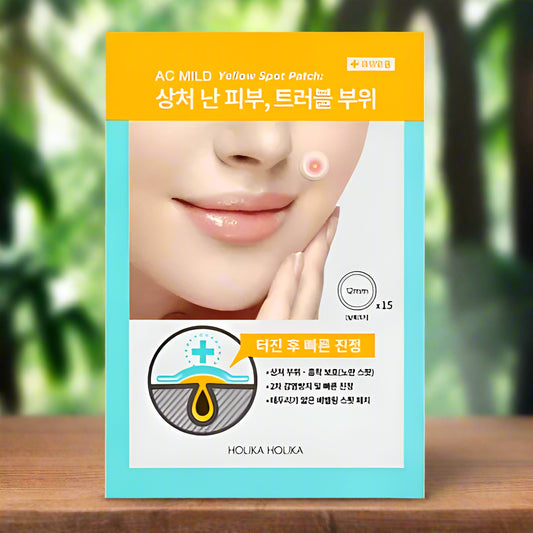 Holika Holika AC Mild Yellow Spot Patch packaging with a person applying the patch on their face.
