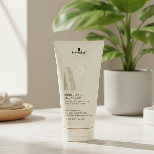 blonde me balm with gold embellishments on a white background