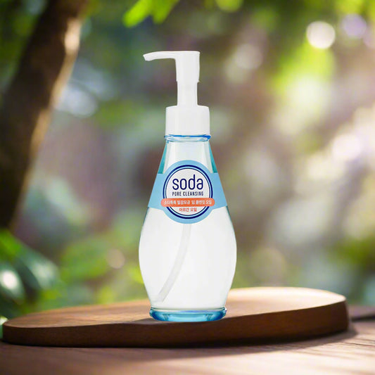 Clear bottle with a blue label on a wooden table with blurred background