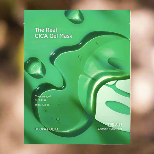 Green packaging of The Real CICA Gel Mask by Holika Holika on a blurred background