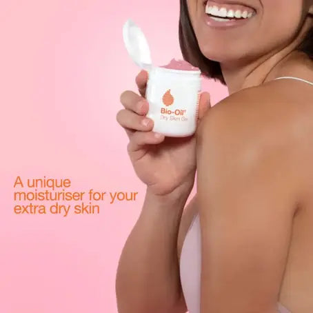 Lily and Co Essentials Bio-Oil Dry Skin Gel 100ml, featuring a woman with dark skin holding the product happily. The text reads: ‘A unique style moisturizer for your extra dry skin.