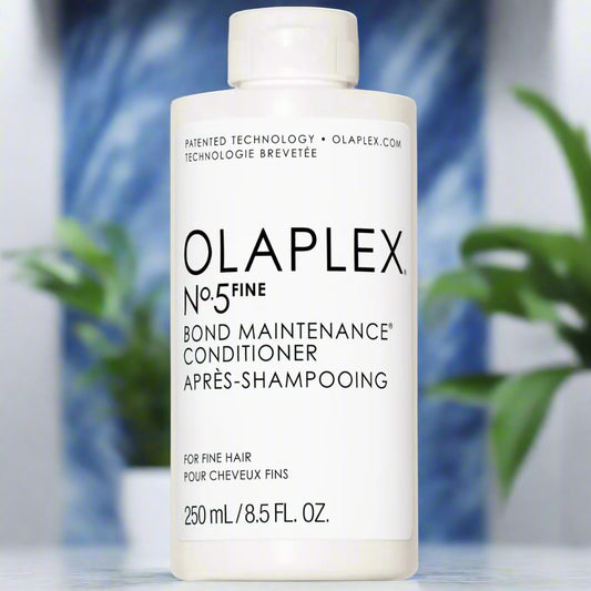 No.4 Fine Bond Maintenance Conditioner in a 250ml bottle, tailored for fine hair. Features elegant, minimalist packaging and delivers targeted hydration, smoothness, and bond-repair benefits.