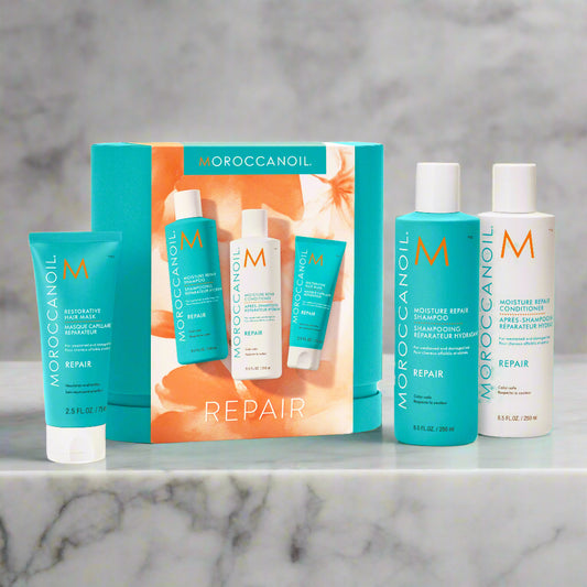 Lily and Co Essentials – Moroccanoil Spring Kit 2025 Repair with shampoo, conditioner, treatment oil, and travel bag.