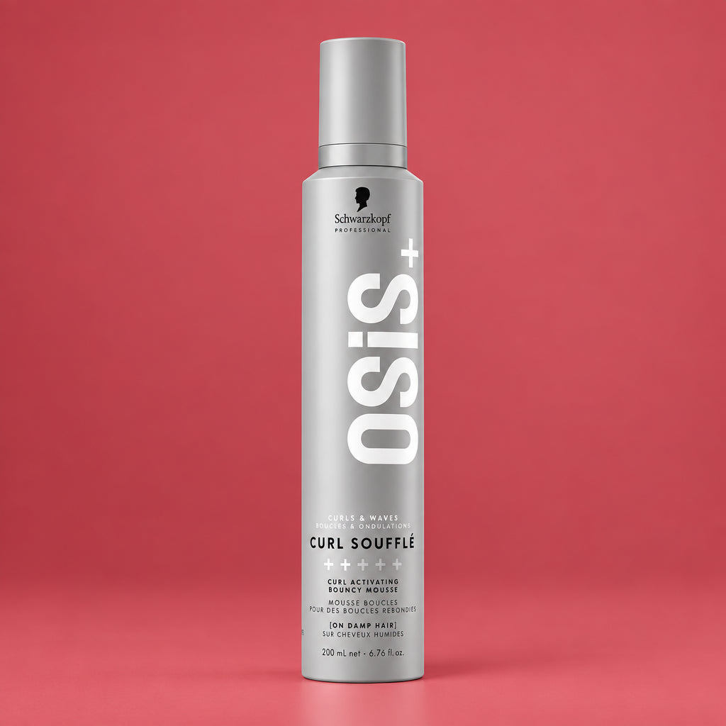 Osis+ Curl Sousse hair styling spray in a tall silver aerosol can with a gray cap, shown on a plain white background.
