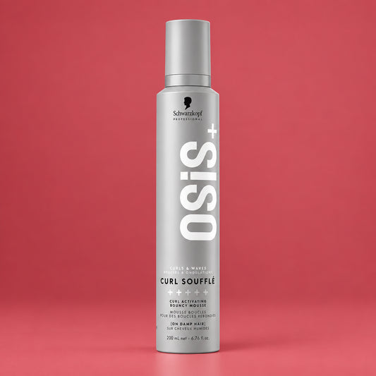 Osis+ Curl Sousse hair styling spray in a tall silver aerosol can with a gray cap, shown on a plain white background.