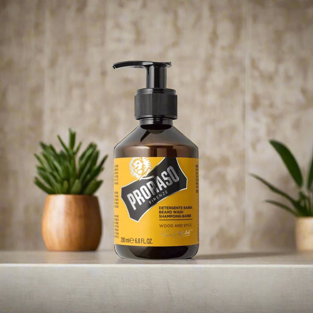 A 200ml bottle of Proraso Beard Shampoo Wood and Spice. The packaging features a dark brown bottle with a clean, classic label, showcasing the warm, woody, and spicy fragrance. The bottle is designed for practical use and highlights the shampoo’s cleansing and hydrating properties.